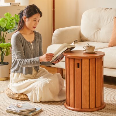 An essential home furniture, this highly flexible storage stool can be used as both a table and a stool.